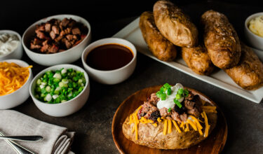 Baked Potato Bar from Delta Blues Smokehouse with your choice of protein